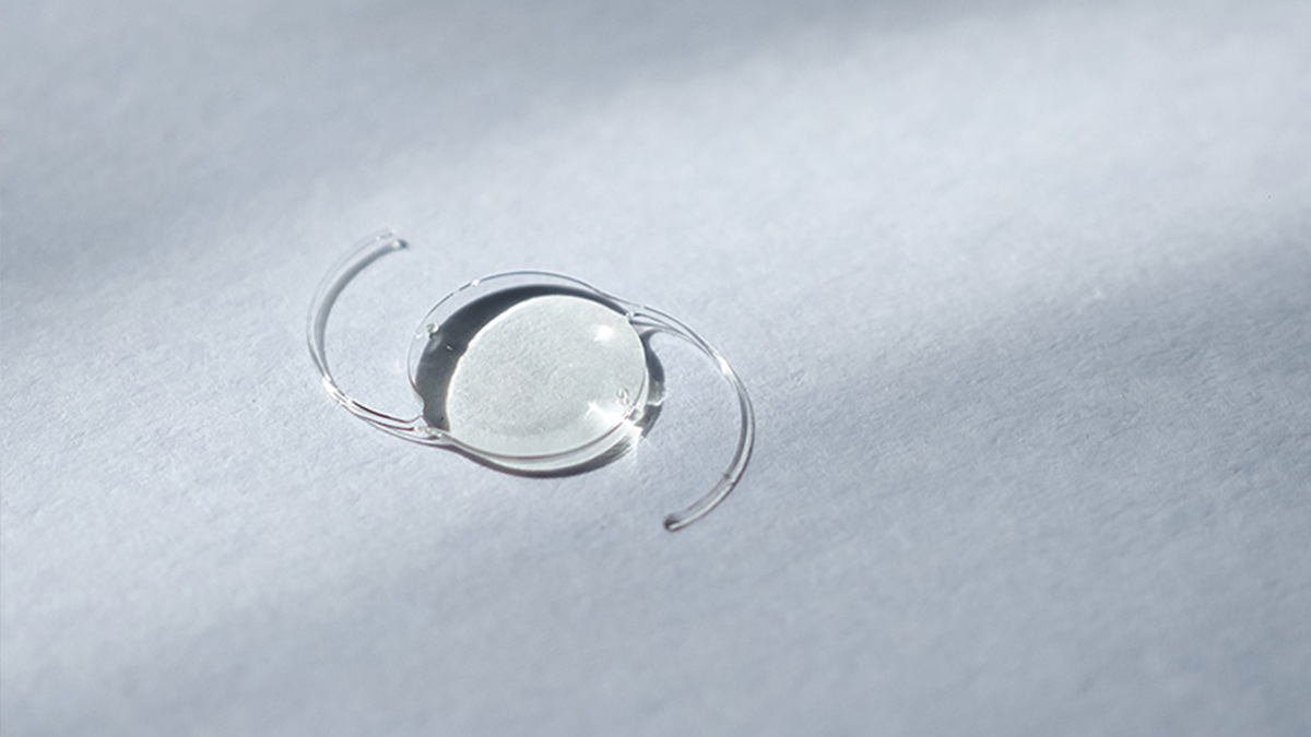 An intraocular lens (IOL) sitting on a table