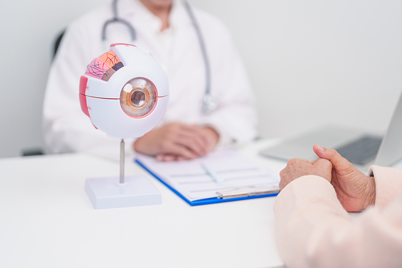 Elderly Patient consulting Doctor for Eye disease