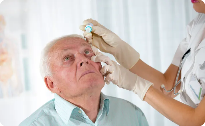 eyesdrops on old asian male